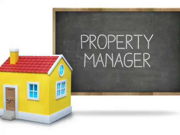 House model next to property manager sign representing property management concept