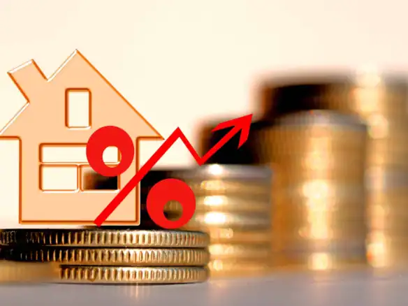 Real estate economy rise shown with coins and percentage graphic